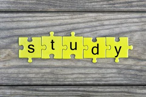 Puzzle with word Study Stock Photos