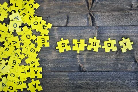 Puzzle with word Study Stock Photos