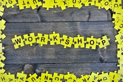 Puzzle with word Workshop Stock Photos