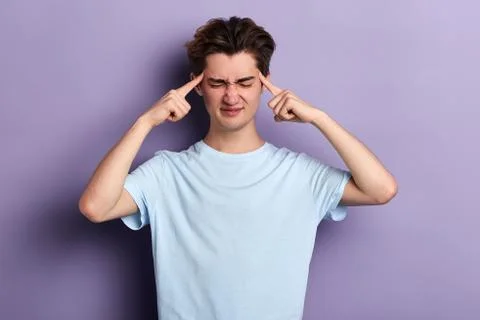 Puzzled angry man cannot remember something Foto stock