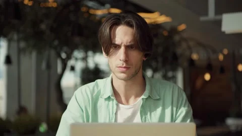 Puzzled man working on freelance project Stock Footage 142484218