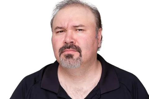 Puzzled middle-aged man with a goatee Stock Photos