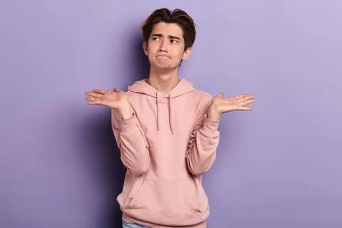 Puzzled serious student doesn't know the answer of the question Stock Photos