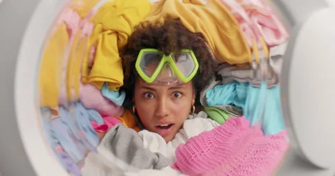 Puzzled surprised young Afro American woman with curly hair wears snorkeling Stock Footage 156967226