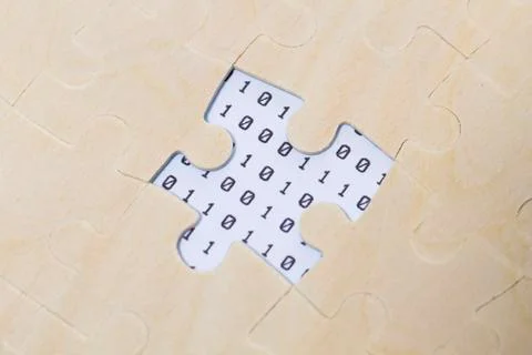 Puzzles and binary code, teamwork, career success 스톡 사진