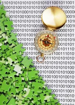Puzzles and compass on a binary code Stockfoto's