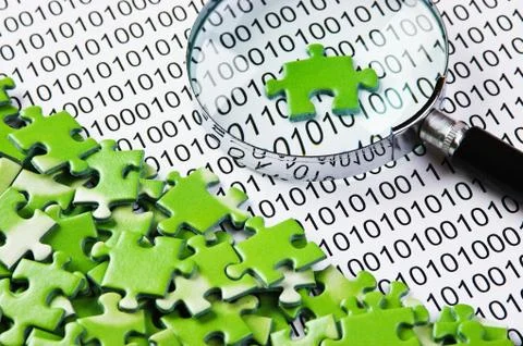 Puzzles and magnifying glass on a binary code イラスト素材