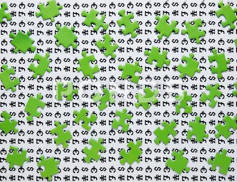 Puzzles and symbols of money Stock Photos