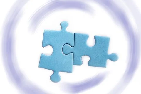 Puzzles on a white background. Solution and teamwork concept Stock Photos