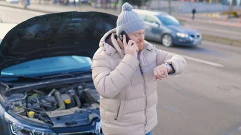 A Puzzling Breakdown A Driver's Emergency Call for Stock Footage 234692517