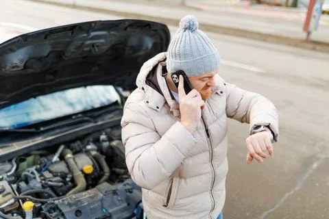 A Puzzling Breakdown A Driver's Emergency Call for Stock Photos