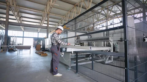 PVC industry worker making PVC frames for windows and doors Stock Footage 283000747
