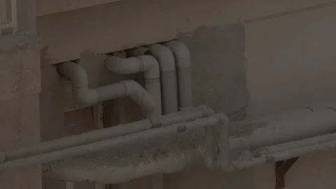 Pvc pipe on wall outside the new building Stock Footage 252107524