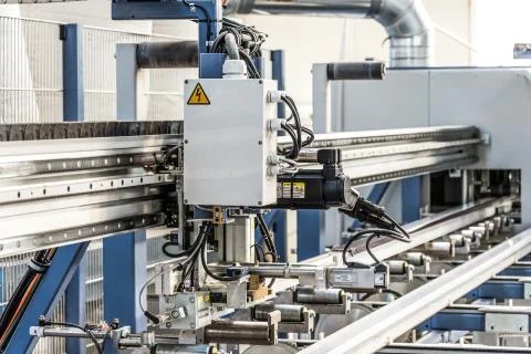 PVC windows automatic line machine cutting sections panels 스톡 사진