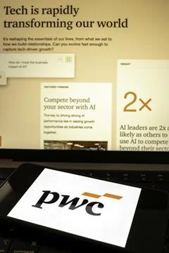 Pwc logo and technology content on laptop Fotos de archivo