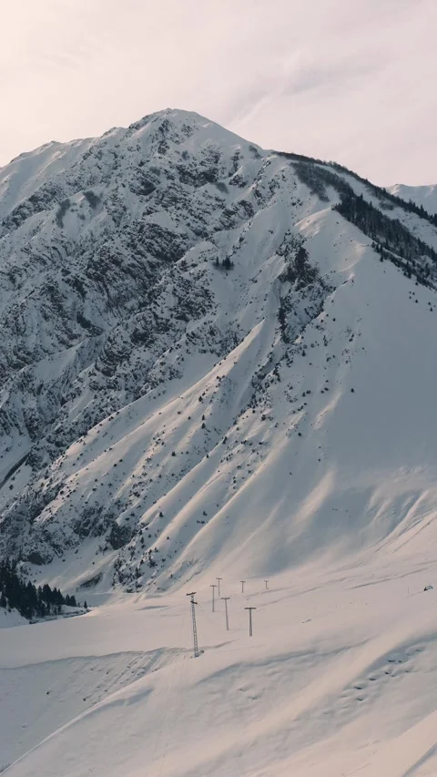 Pwoer supply lines in remote winter landscaep clouds timelapse Stock Footage 328960516