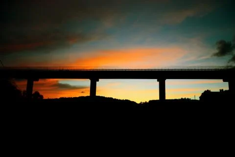 Pylon bridge at sunset. Paved bridge at sunset Stock Photos