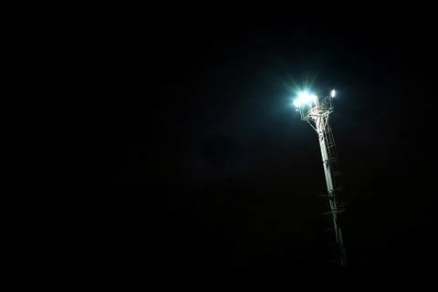 Pylon floodlight black background Stock Photos