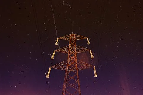 Pylon in the night sky Foto stock