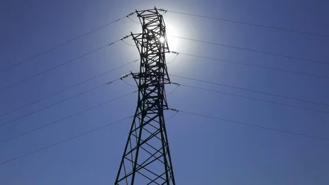 Pylon power line on blue sky background Stock Footage 80757283