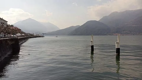 Pylons in the lake, in front of Bellano Video stock 273556586
