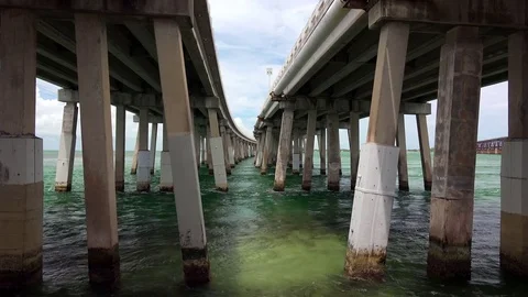 Pylons In Ocean Under Elevated Overseas Highway in Florida Keys Stock Footage 72384749