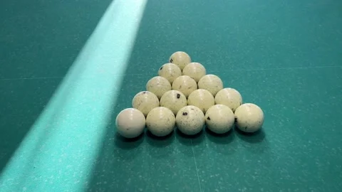 Pyramid of balls on the green field of Russian billiards, ivory balls, break the Stock Footage 194451997