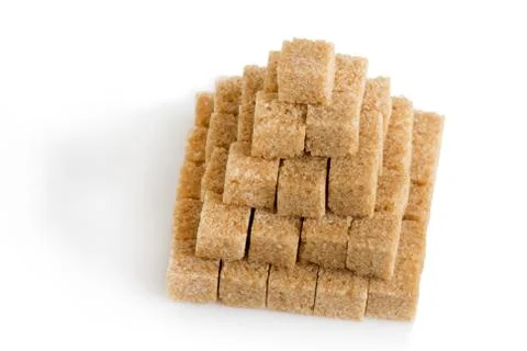 Pyramid of cane sugar cubes Stock Photos