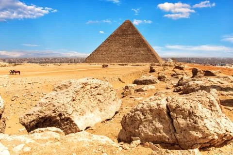 The Pyramid of Cheops and stones in the desert of Giza, Egypt Stock Photos