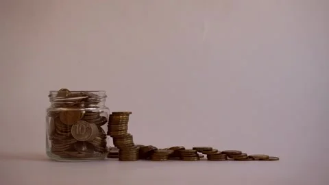 A pyramid consisting of coins. Vídeos de archivo 206346114