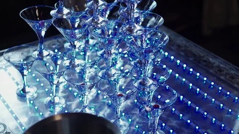 Pyramid of glasses with champagne Stock Footage