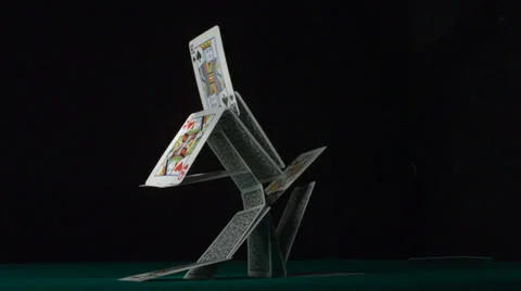 pyramid-house-playing-cards-falling-foot