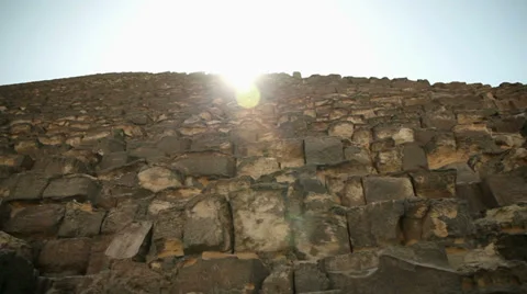 Pyramid huge bricks with sun shining above Stock Footage 30901833