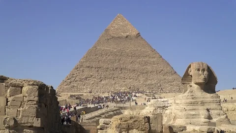 Pyramid of Khafre or Chephren and the Great Sphinx of Giza in Cairo, Egypt Stock Footage 125451646