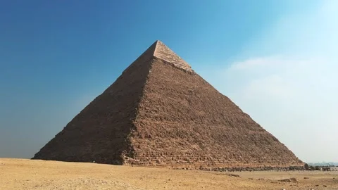 Pyramid of Khafre Seen from Ground Level across the Sandy Giza Plateau with Blue Stock-Footage 341840145
