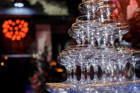 Pyramid of martini glasses on the table Stock Photos