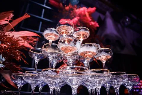 Pyramid of martini glasses on the table Stock Photos