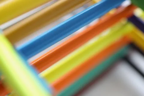 Pyramid shape made with some different colored wood pencil crayons Stock Photos