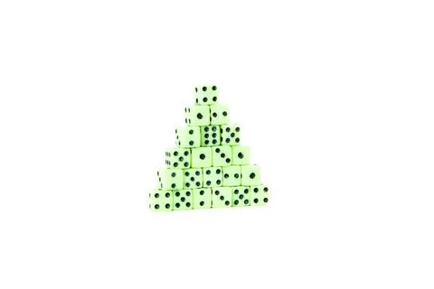 Pyramid of tiny neon green dice stacked over white side view Stock Photos