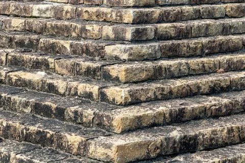 Pyramidal structure made of stones. Stepped structure made of stone blocks. Stock Photos