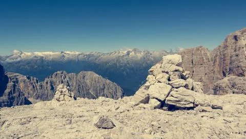 Pyramide built of rocks to guide lost mountaineers. Stock Photos