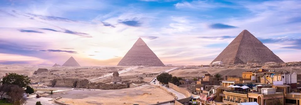 Pyramids and Sphinx at sunset Foto stock