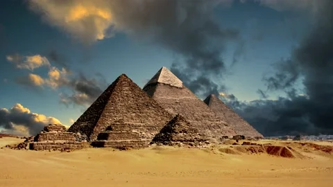 Pyramids in egypt, desert, sand - time lapse clouds at sunset Stock-Footage 147451603