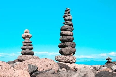 Pyramids of gray balanced rocks Stock Photos