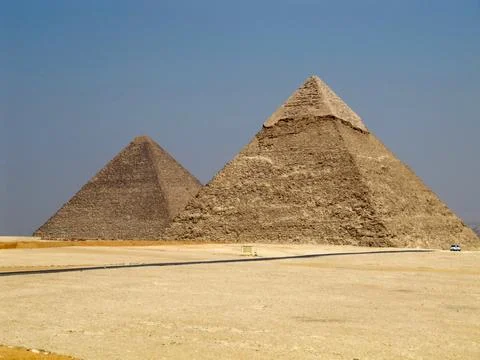 Pyramids of Khafre and Cheops in Giza view from the side of the desert Stock Photos