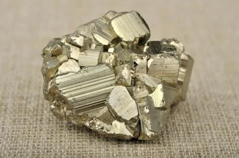 Pyrite in the background of a burlap Stock Photos