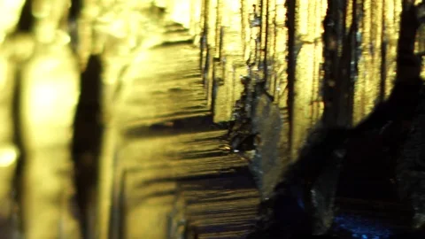 Pyrite crystal illuminated by colored light. Abstract color background Stock Footage