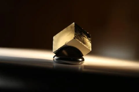 Pyrite Cube on a Hematite Ring Stock Photos