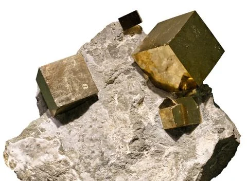 Pyrite cubes embedded in a matrix on white background Stock Photos