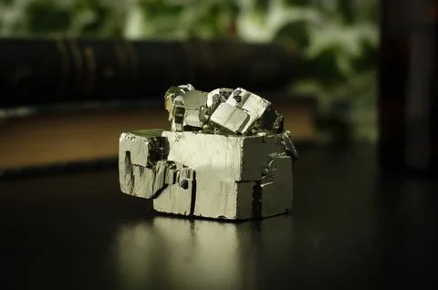 Pyrite cubic crystals on table Stock Photos